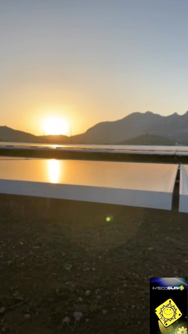 Solar farm at sunrise - INTECOTECH